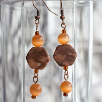 Fideline earrings with orange beads